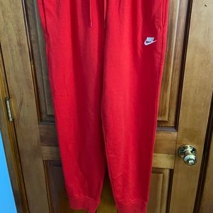 orange nike sweatpants, never worn, in perfect condition